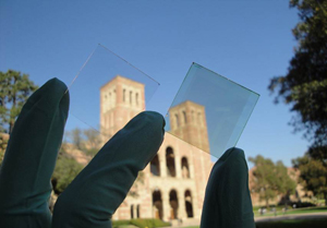 Window glass dressed with the new transparent polymer solar cell, made from photoactive plastic, which produces energy by absorbing and converting infrared light into an electric current. Â©UCLA 